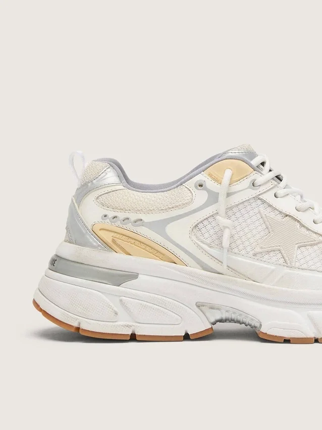 Lightstar da uomo in pelle bianca e mesh con stella in effetto consumato