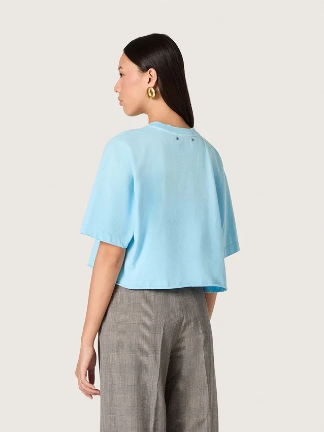 Maglietta corta da donna in jersey di cotone azzurro con stampa grafica
