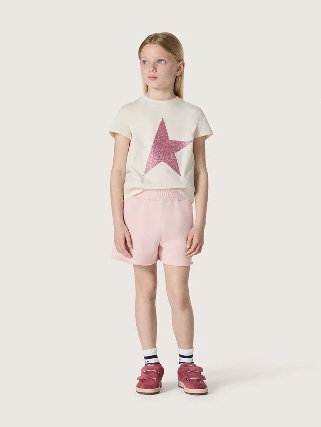 Maglietta da bambina “Star” in jersey di cotone bianco con stella rosa glitterata