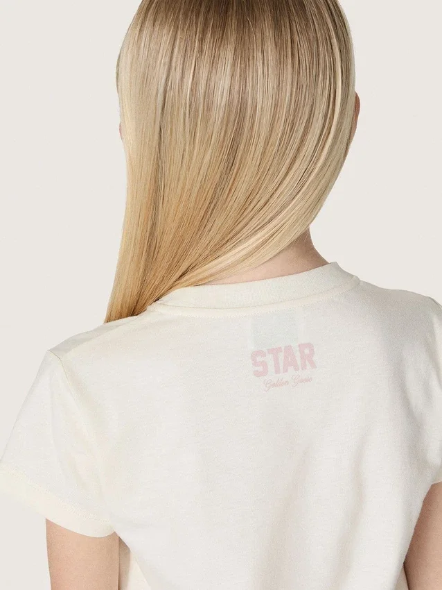 Maglietta da bambina “Star” in jersey di cotone bianco con stella rosa glitterata
