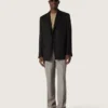Maglietta unisex in jersey di cotone beige con logo ricamato