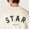 Maglietta unisex Star in cotone bianco vintage con stampa nera sul retro