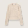Maglione corto a girocollo in lana beige con cristalli su tutta la superficie