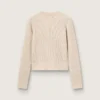 Maglione corto a girocollo in lana beige con cristalli su tutta la superficie