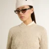 Maglione corto a girocollo in lana beige con cristalli su tutta la superficie