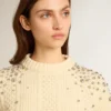 Maglione corto da donna effetto "worn-white" con cristalli decorativi