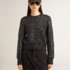 Maglione corto da donna in misto lana nero con paillettes su tutta la superficie