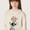 Maglione da bambina Golden in filato di cotone bianco con ricamo della mascotte