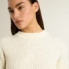 Maglione da donna a girocollo in lana merino bianca con cristalli su tutta la superficie