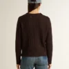Maglione da donna a girocollo in misto lana con bottoni dorati