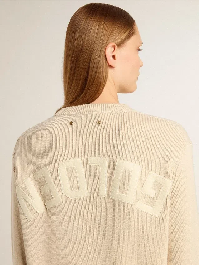 Maglione da donna beige con scritta “Golden” sul retro