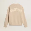 Maglione da donna beige con scritta “Golden” sul retro