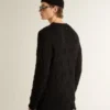 Maglione da uomo in lana nera con effetto consumato