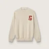 Maglione unisex a girocollo in cotone beige con toppa sul davanti e logo sul retro