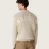 Maglione unisex a girocollo in cotone beige con toppa sul davanti e logo sul retro