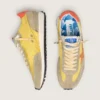 Marathon da donna con tomaia in nylon giallo e stella arancione