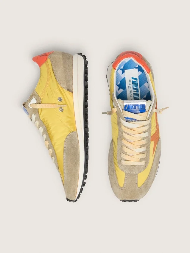 Marathon da donna con tomaia in nylon giallo e stella arancione