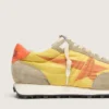 Marathon da donna con tomaia in nylon giallo e stella arancione