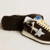 Marathon da donna con tomaia in nylon nero e stella bianca