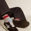 Marathon da uomo con tomaia in nylon ripstop nero e stella argentata