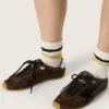 Marathon Speed da donna in pelle con stampa serpente marrone, stella nera e linguetta sul tallone in pelle argentata
