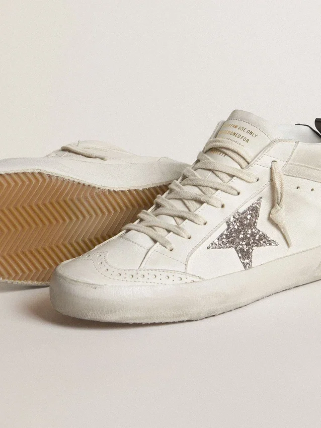 Mid Star da donna con stella glitterata argento e linguetta sul tallone laminata nera