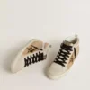 Mid Star da donna in pelle Naplak beige con stella in pelle di pony con stampa leopardata