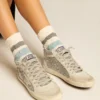 Mid Star in glitter argento con stella e striscia in pelle scamosciata grigio ghiaccio