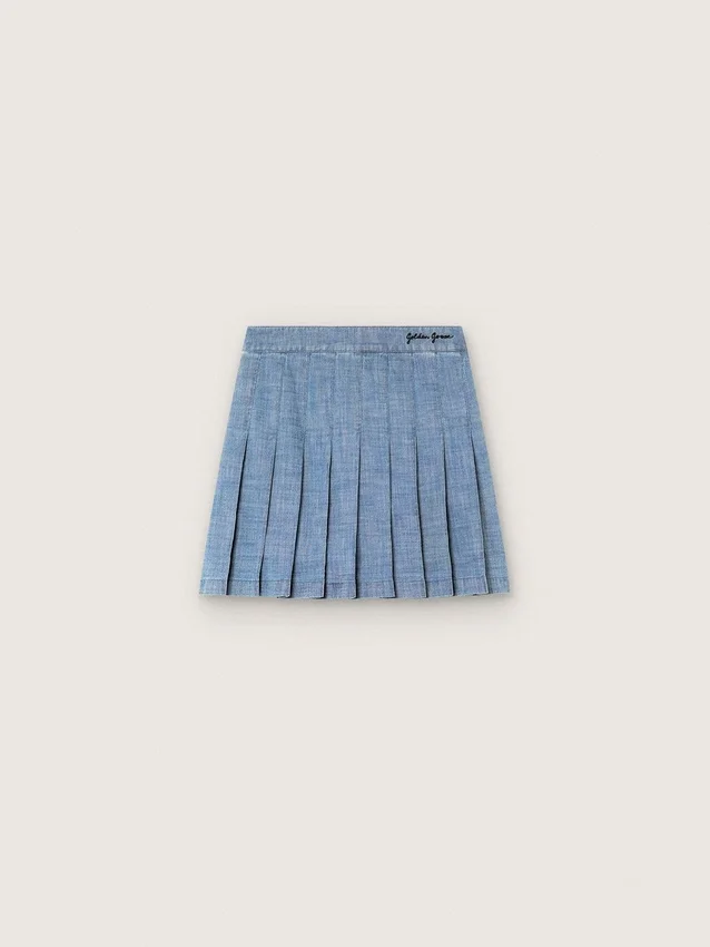 Minigonna a pieghe da bambina “Journey” in chambray di cotone azzurro con logo ricamato