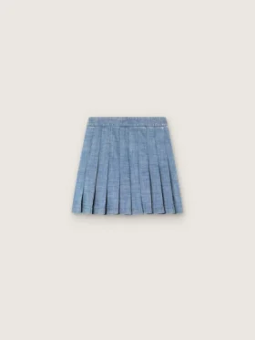 Minigonna a pieghe da bambina “Journey” in chambray di cotone azzurro con logo ricamato