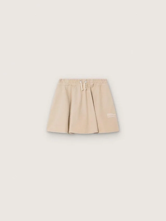 Minigonna da bambina “Journey” in gabardina di cotone beige con stampa