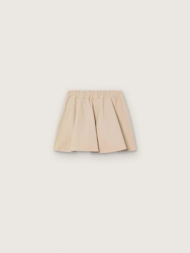 Minigonna da bambina “Journey” in gabardina di cotone beige con stampa