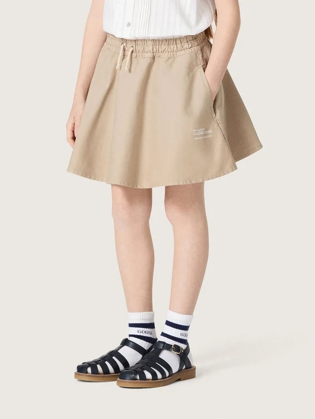 Minigonna da bambina “Journey” in gabardina di cotone beige con stampa