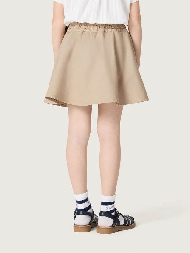 Minigonna da bambina “Journey” in gabardina di cotone beige con stampa