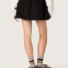 Minigonna da donna in twill di cotone nero con ricamo floreale in paillettes