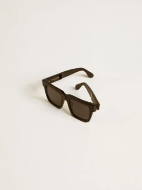 Occhiali da sole Jamie dal design squadrato con montatura nera e logo dorato