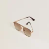 Occhiali da sole stile aviatore con montatura dorata e lenti beige