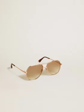 Occhiali da sole stile aviatore con montatura in oro rosa e lenti color miele