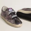 Old School da donna in pelle laminata viola con stella in nabuk lilla e linguetta sul tallone