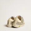 Old School Junior in glitter platino con stella in pelle e linguetta sul tallone