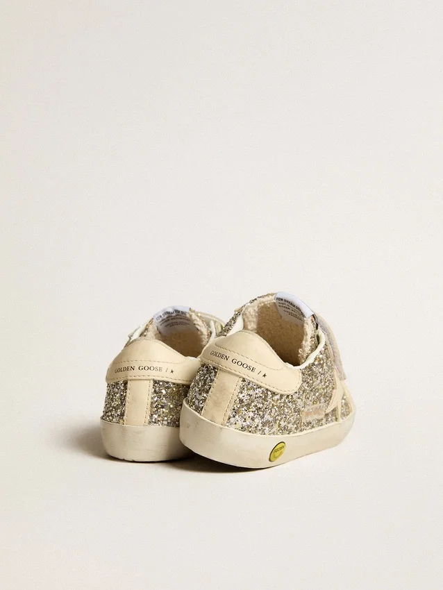 Old School Junior in glitter platino con stella in pelle e linguetta sul tallone