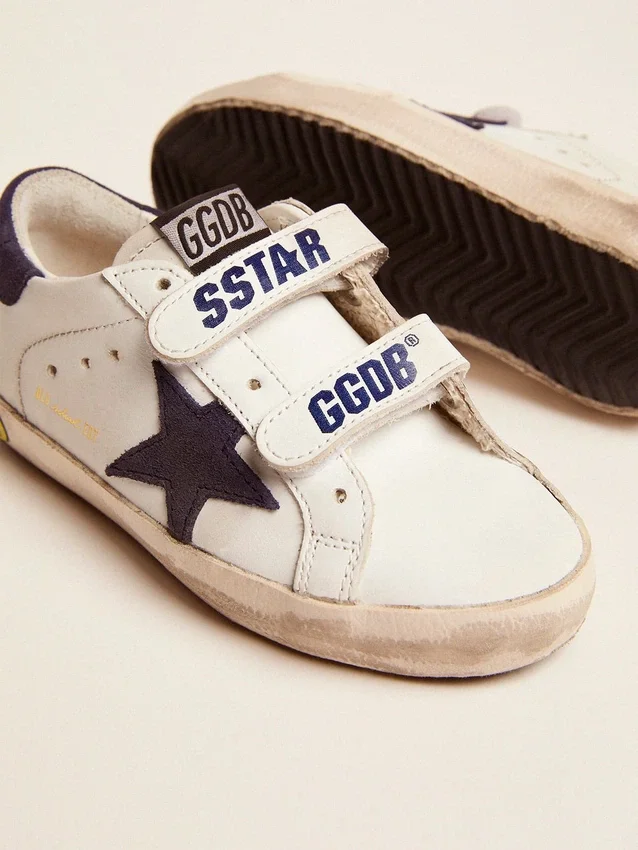 Old School Young in pelle bianca con stella in camoscio blu e linguetta sul tallone