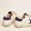 Old School Young in pelle bianca con stella in camoscio blu e linguetta sul tallone