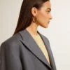 Orecchini a cerchio con maglie intrecciate color oro antico