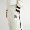 Pantaloncini bianchi per bambini con logo ricamato