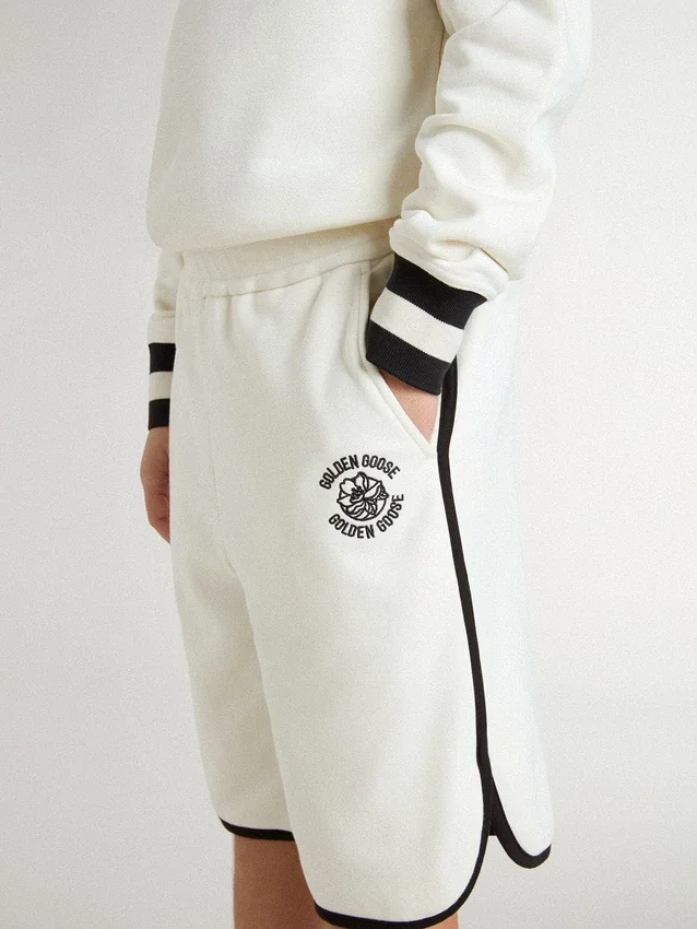 Pantaloncini bianchi per bambini con logo ricamato