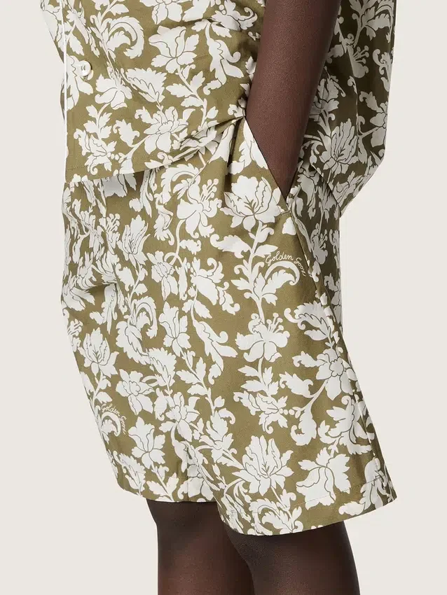 Pantaloncini da bambino Journey in tela di cotone con stampa floreale verde e bianca