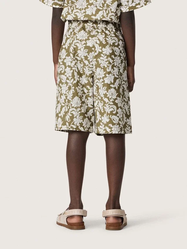 Pantaloncini da bambino Journey in tela di cotone con stampa floreale verde e bianca