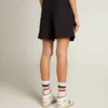 Pantaloncini da donna in gabardina di lana nera con cintura in vita