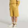 Pantaloncini da jogging per bambini in giallo ocra con ricami